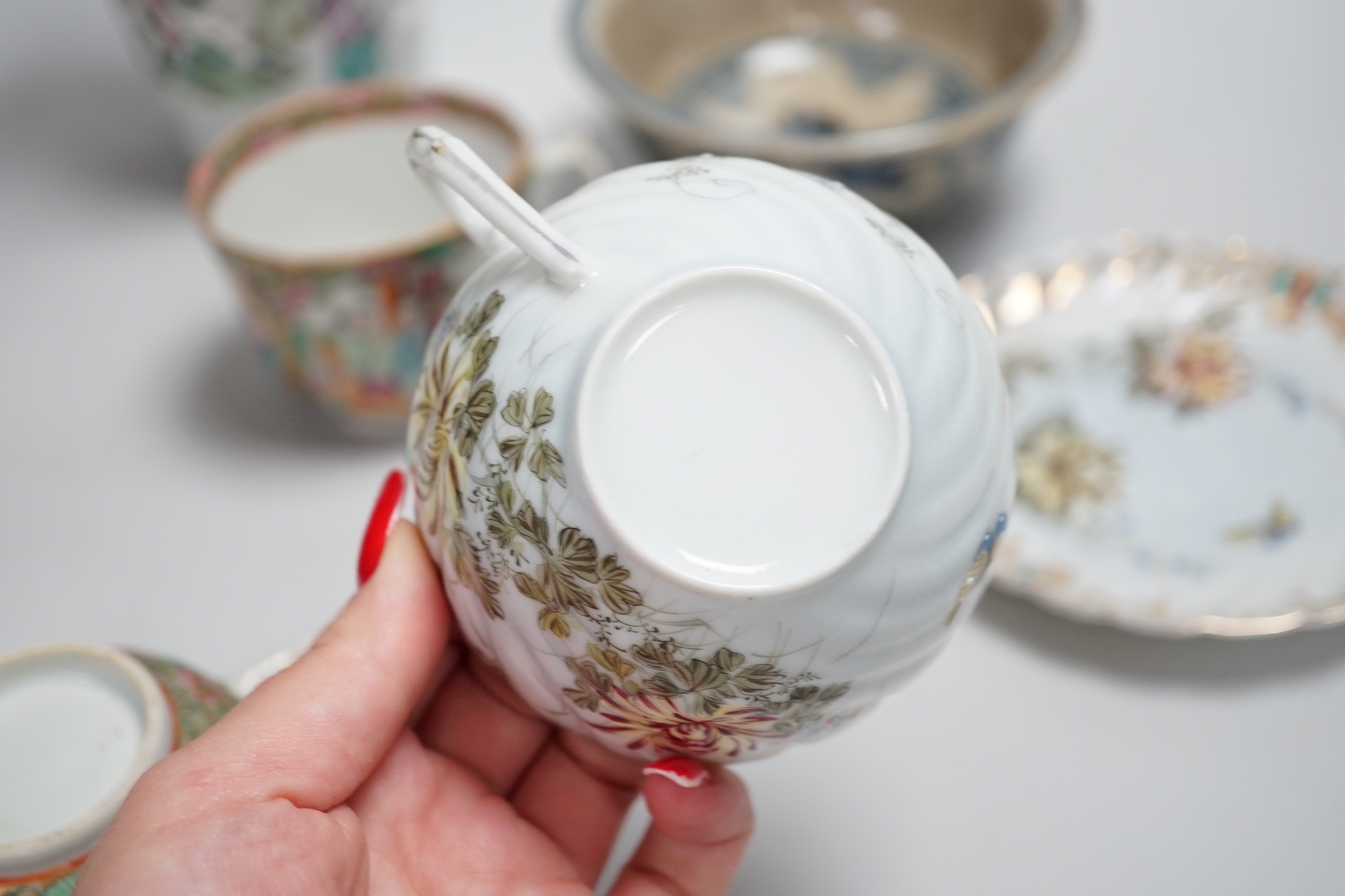 Chinese and Japanese ceramics including Canton cups and blue and white tea bowl, the largest 25cm high